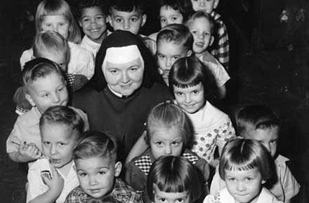 Sister and young children, 1957